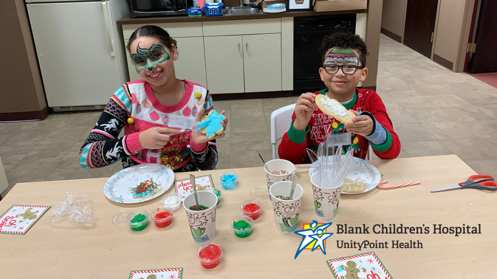 photos of kids decorating cookies at holiday drop-off