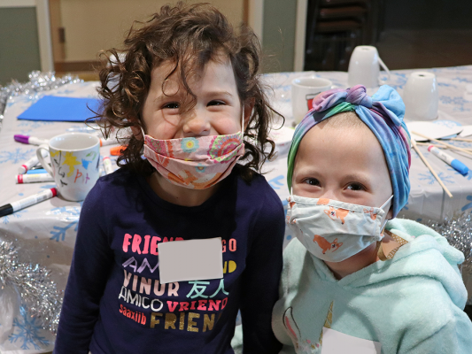 smiling girls at holiday dropoff