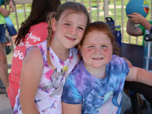 sisters at the park during day camp